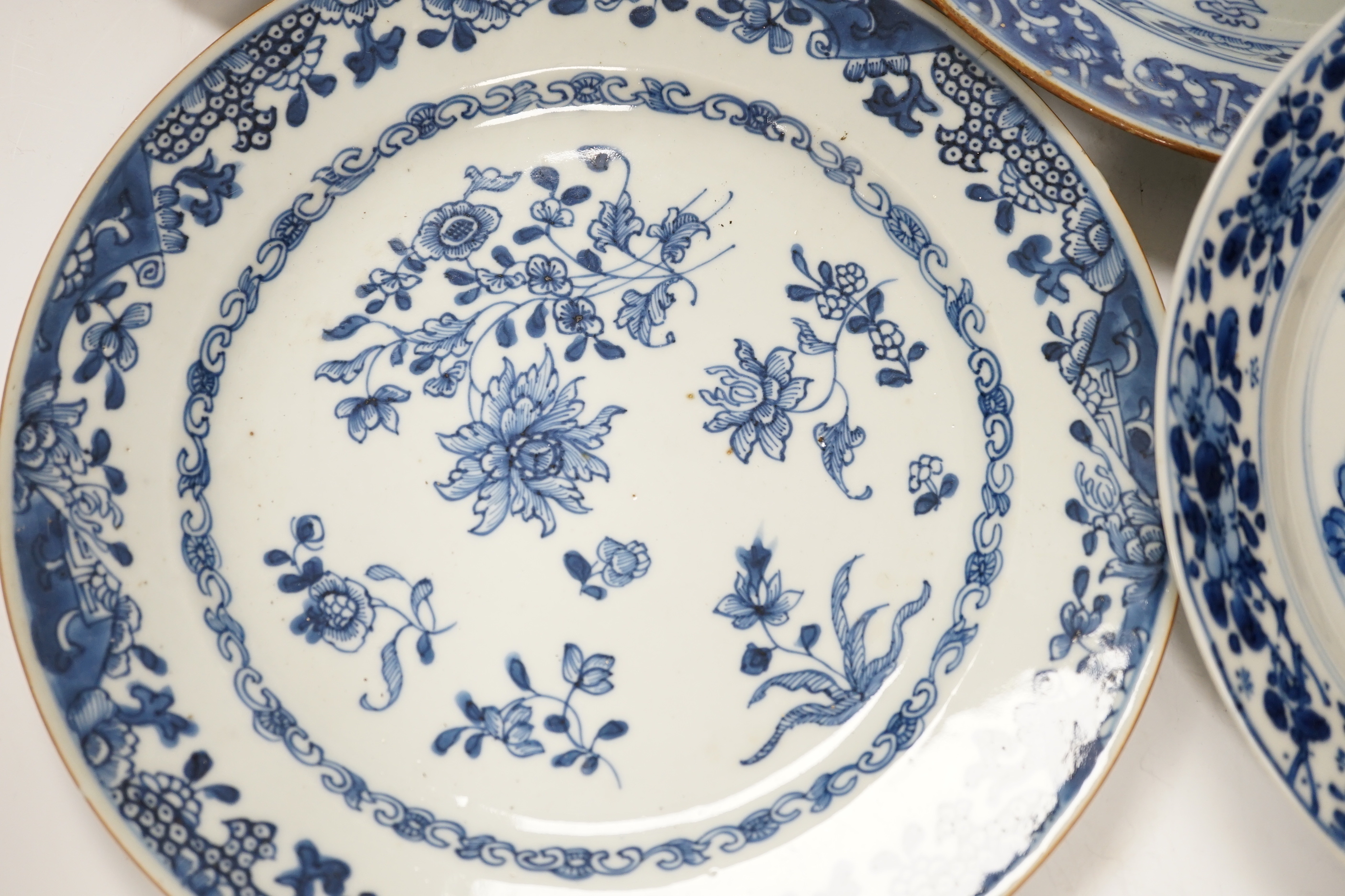 Six 18th century Chinese blue and white dishes and plates, largest 23cm diameter